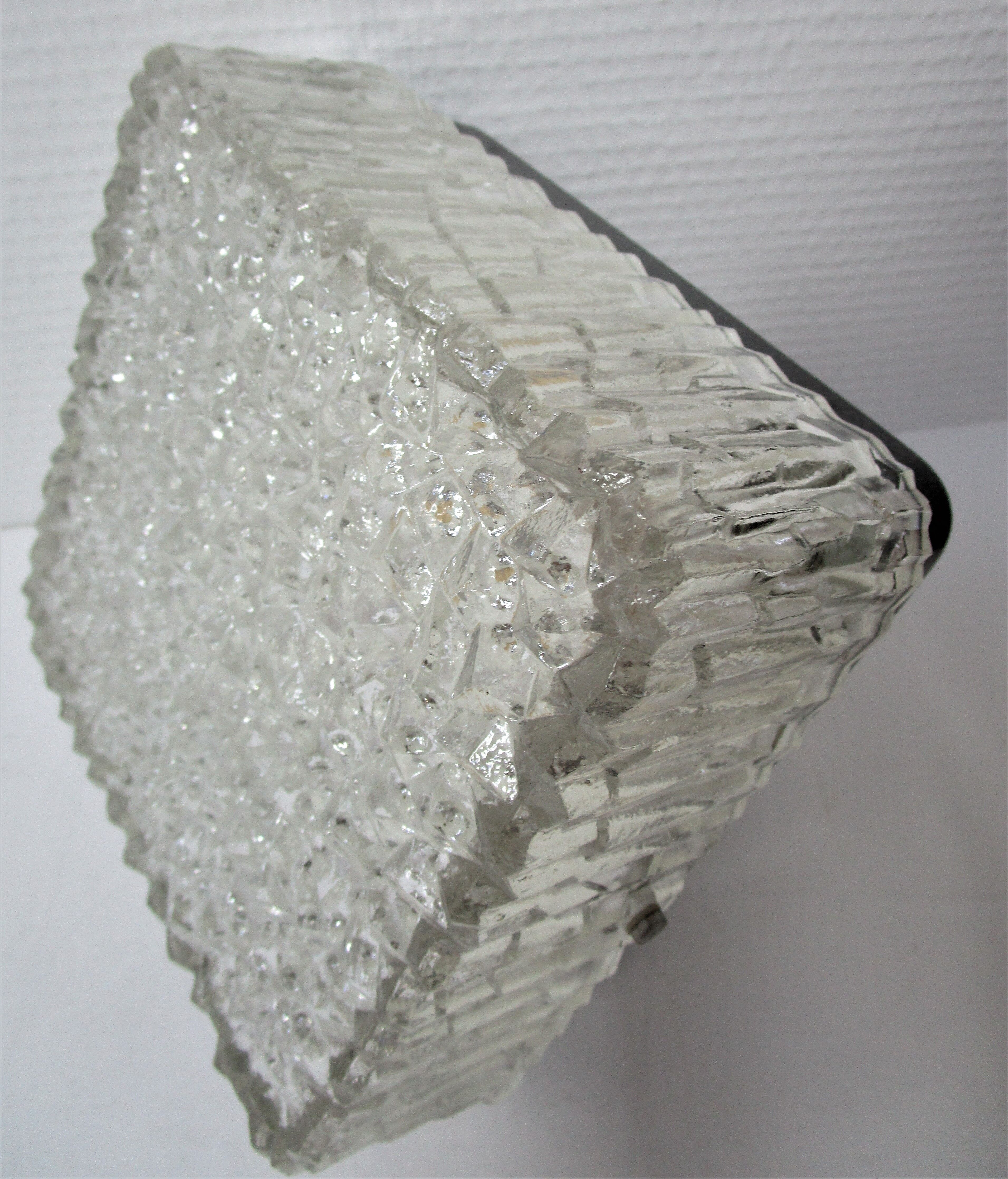 Holophane brand square wall light in moulded thick glass