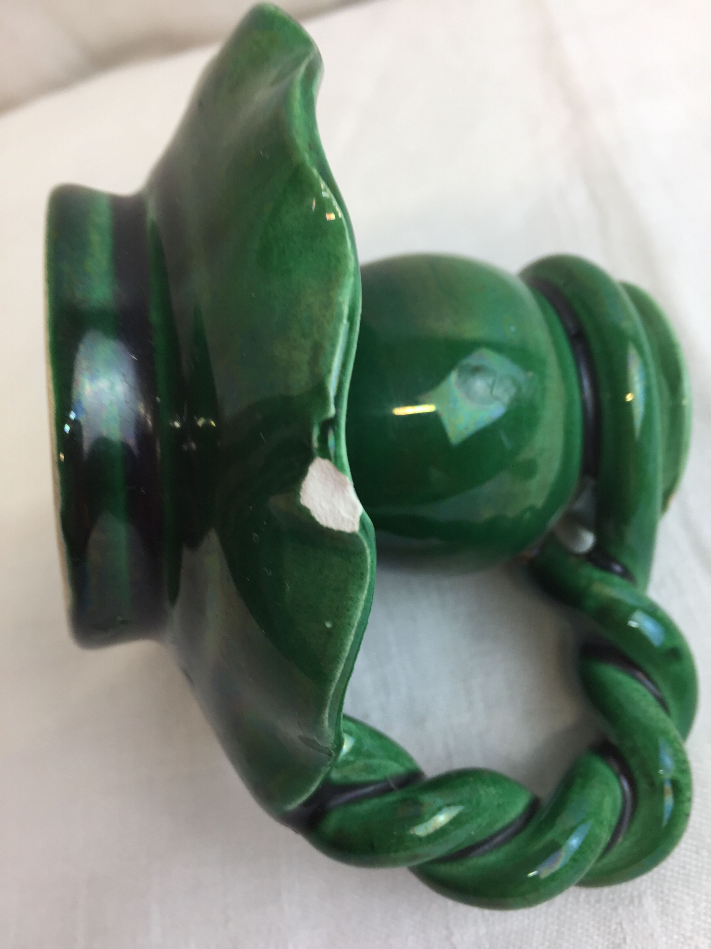 Old candleholder, glazed terracotta cellar, artisanal green color