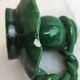 Old candleholder, glazed terracotta cellar, artisanal green color