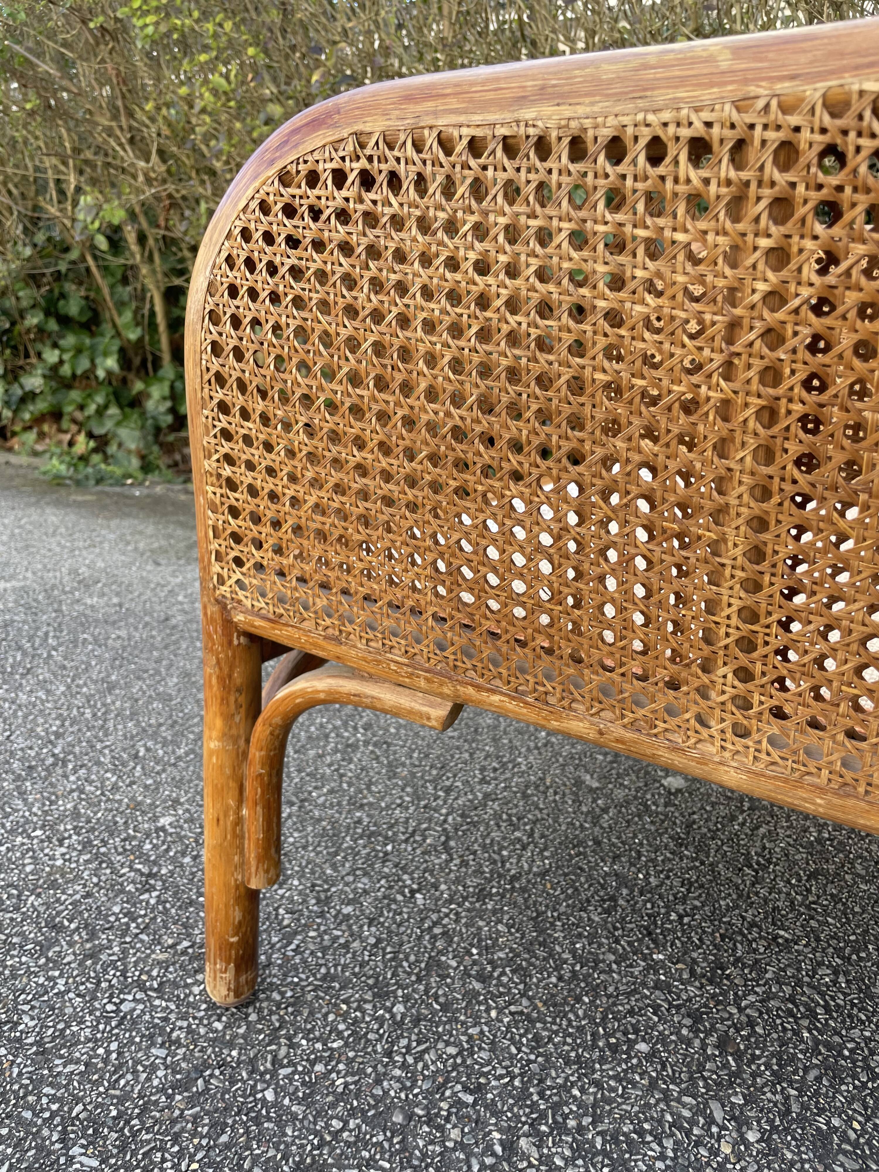 Paire de fauteuils en rotin et cannage