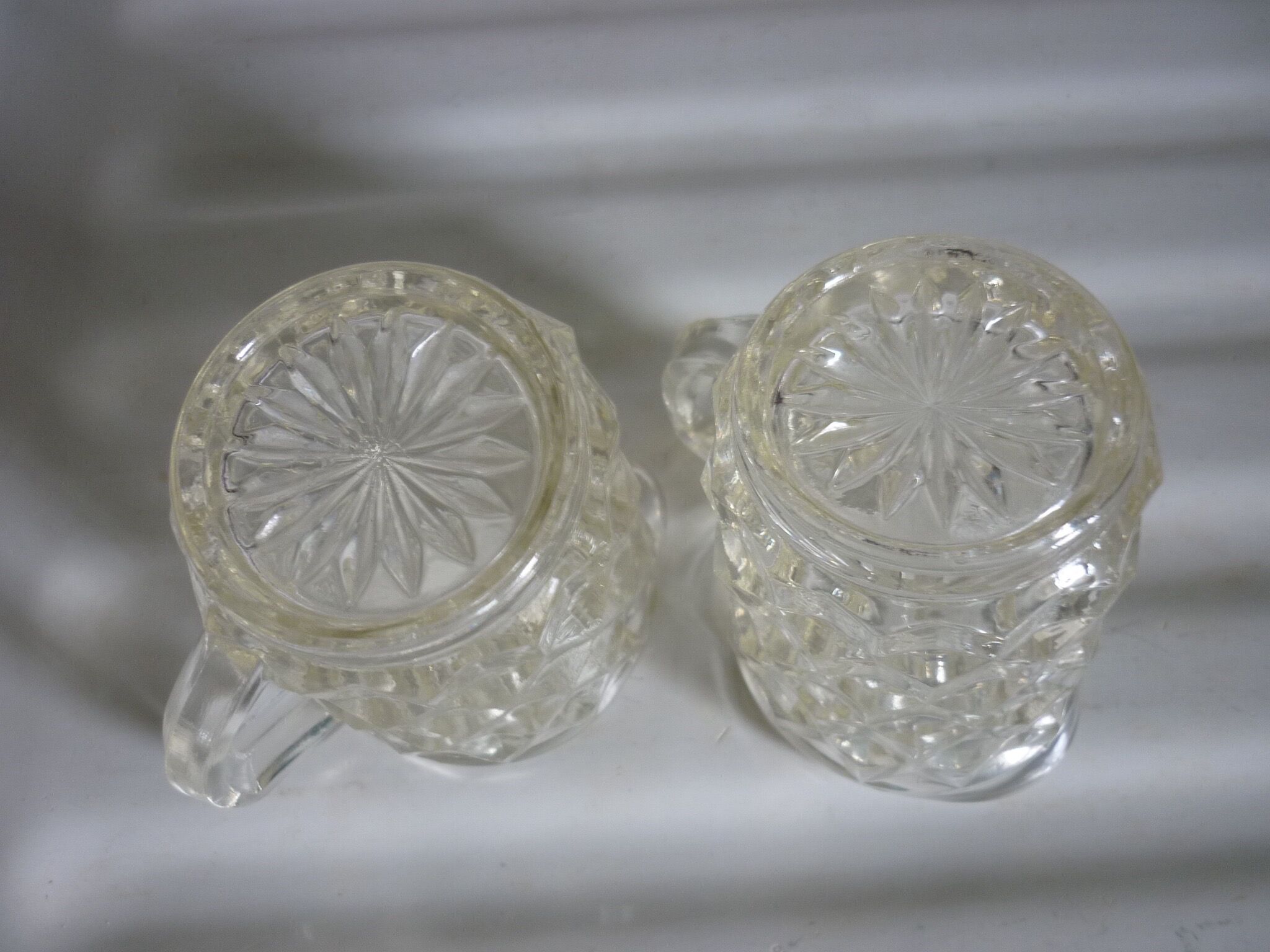 Lot of milk pots or moulded glass cream jars