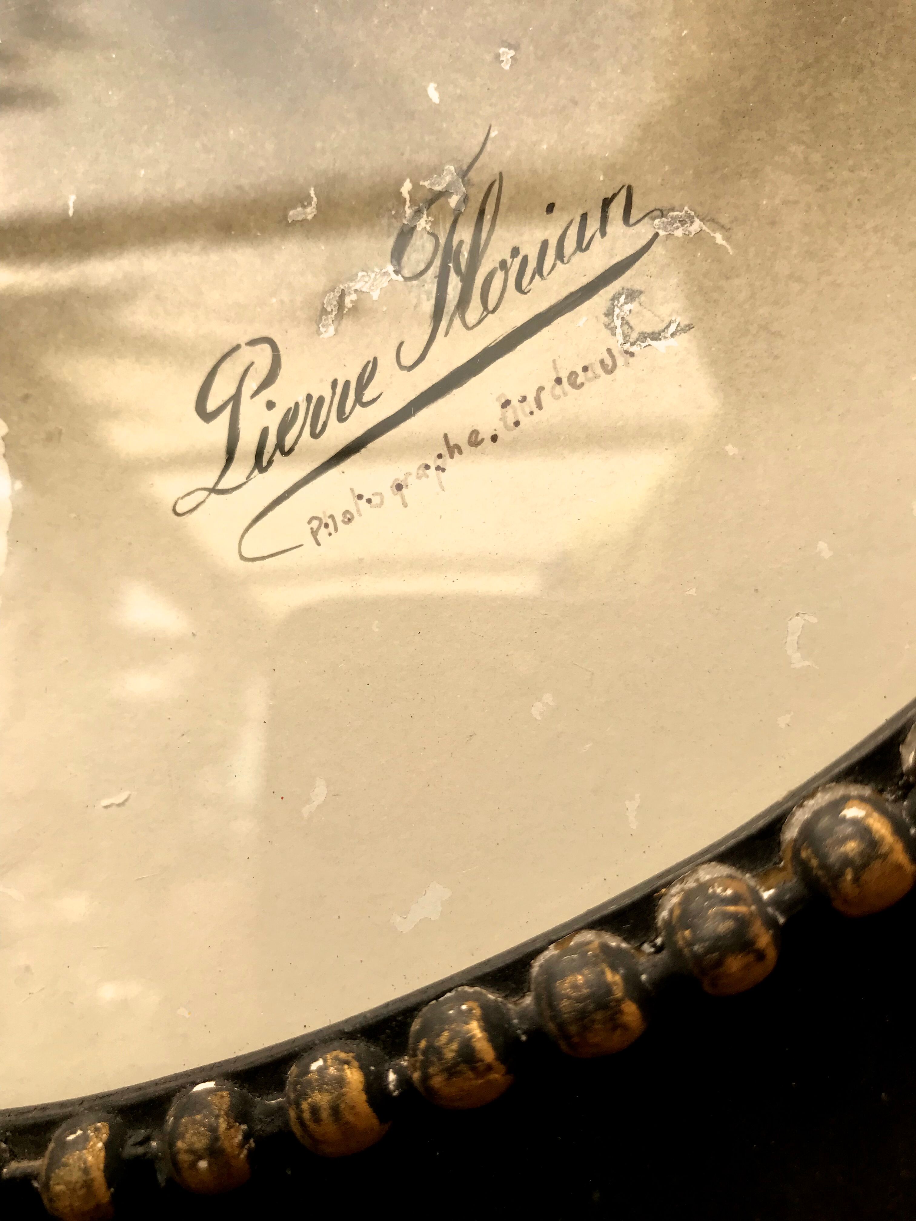 Black and gilded ebonite frame, wood and plaster 19th century