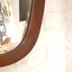 Oval hall mirror, wooden frame. Scandinavia 1960s 33x100cm