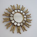 Sun mirror in gilded wood with inlays
