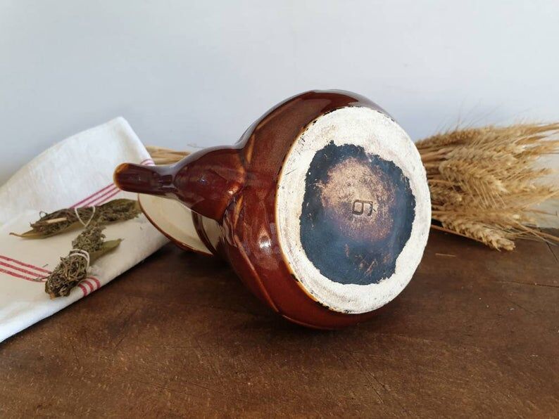 Vintage tea maker in old-fashioned country house-style earthenware