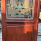 Late 19th century store doors, haberdashery front with Art Nouveau stained glass windows