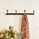 Wall-mounted coat rack with 4 hooks in metal and brass