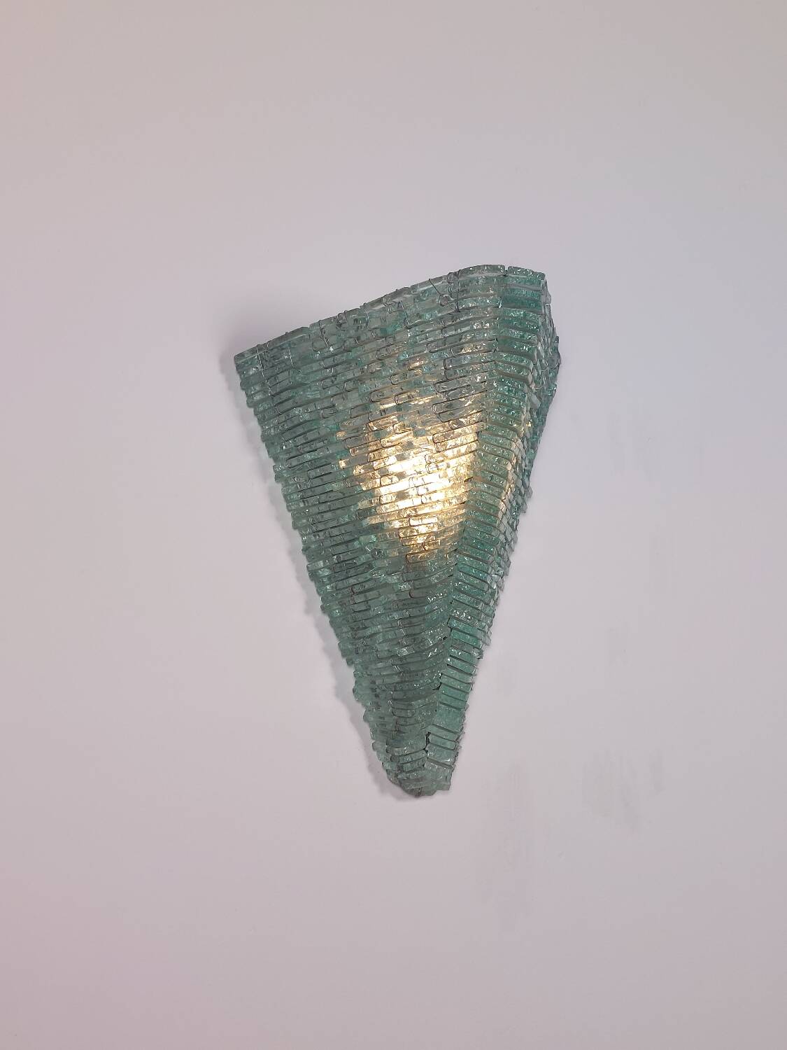 Pair of pyramid-shaped wall sconces in glass in vintage French style.