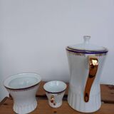 Coffee pot, sugar pot, 1 cup and saucer.