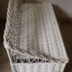Trunk storage painted rattan bench
