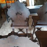 4 stylized dolphin back chairs