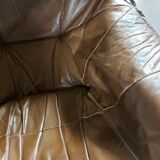 Armchairs in leather and vintage wood 70's