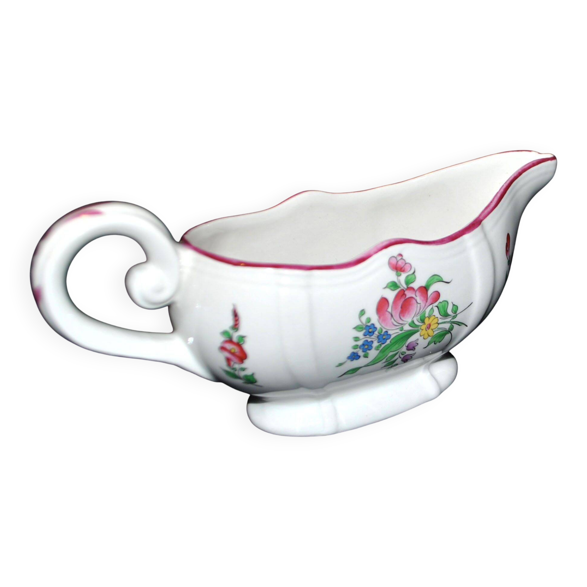 Lunéville KG earthenware sauce boat with polychrome painted flowers, revolving lamp.