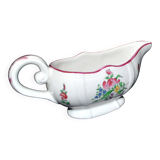 Lunéville KG earthenware sauce boat with polychrome painted flowers, revolving lamp.