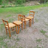 Suite of 9 straw chairs