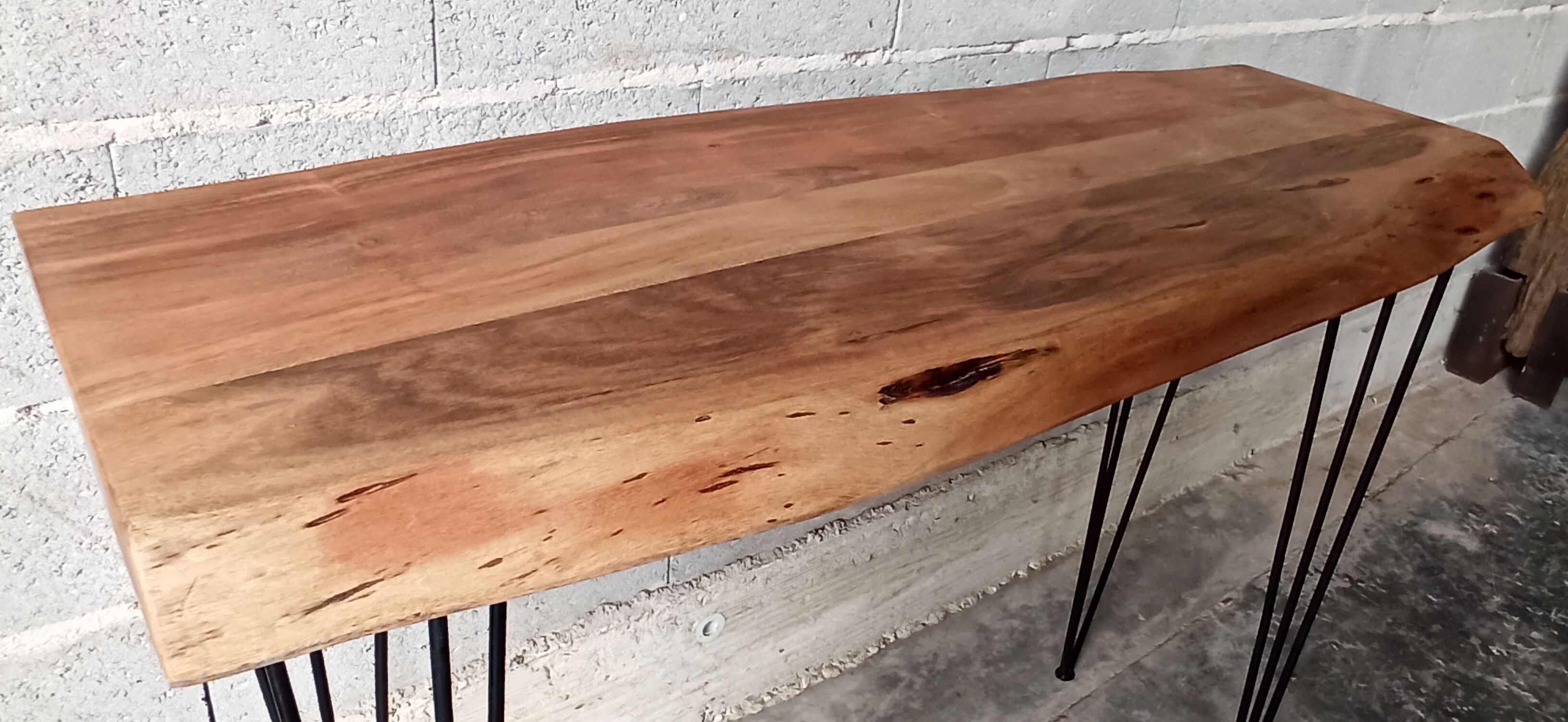 Wooden console with metal feet