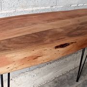Wooden console with metal feet