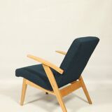 Fauteuil vintage scandinave bleu marin bouclé design moderne milieu siècle