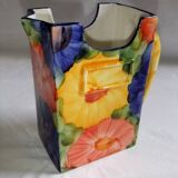 Ceramic vase pitcher decorated with flowers