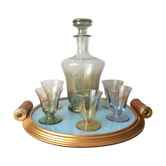 Aperitif liqueur service in iridescent glass on tray