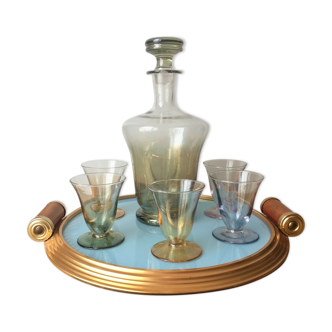 Aperitif liqueur service in iridescent glass on tray