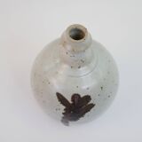 Stoneware bottle with abstract plant motif signed Herbes Folles