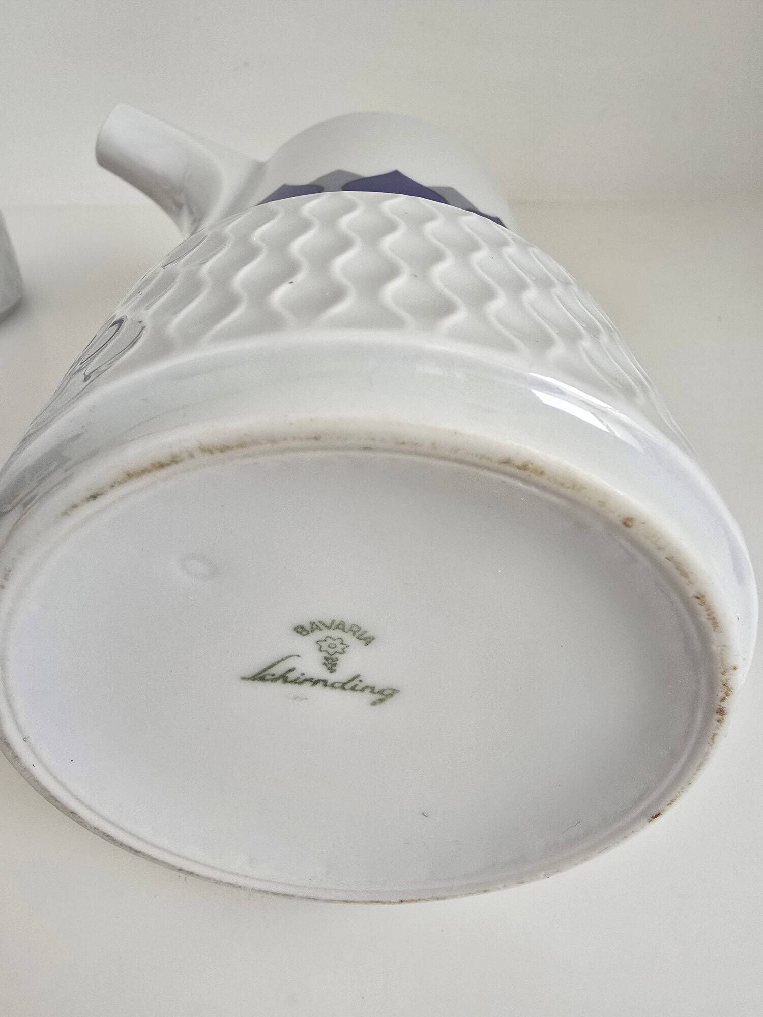 Vintage Schirnding Bavaria coffee pot and milk jug, blue geometric pattern.