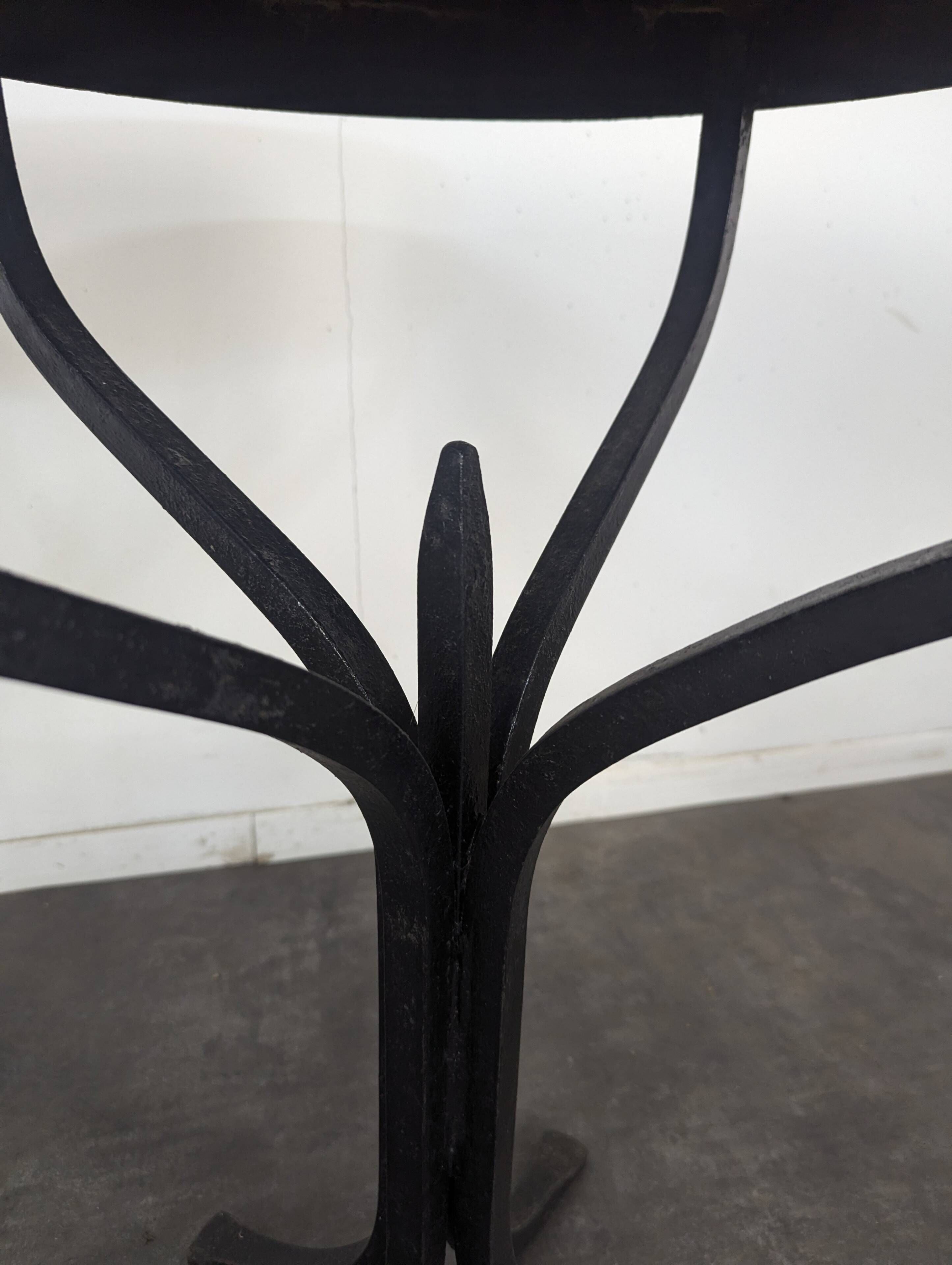 Wrought iron gueridon with a marble top circa 1950