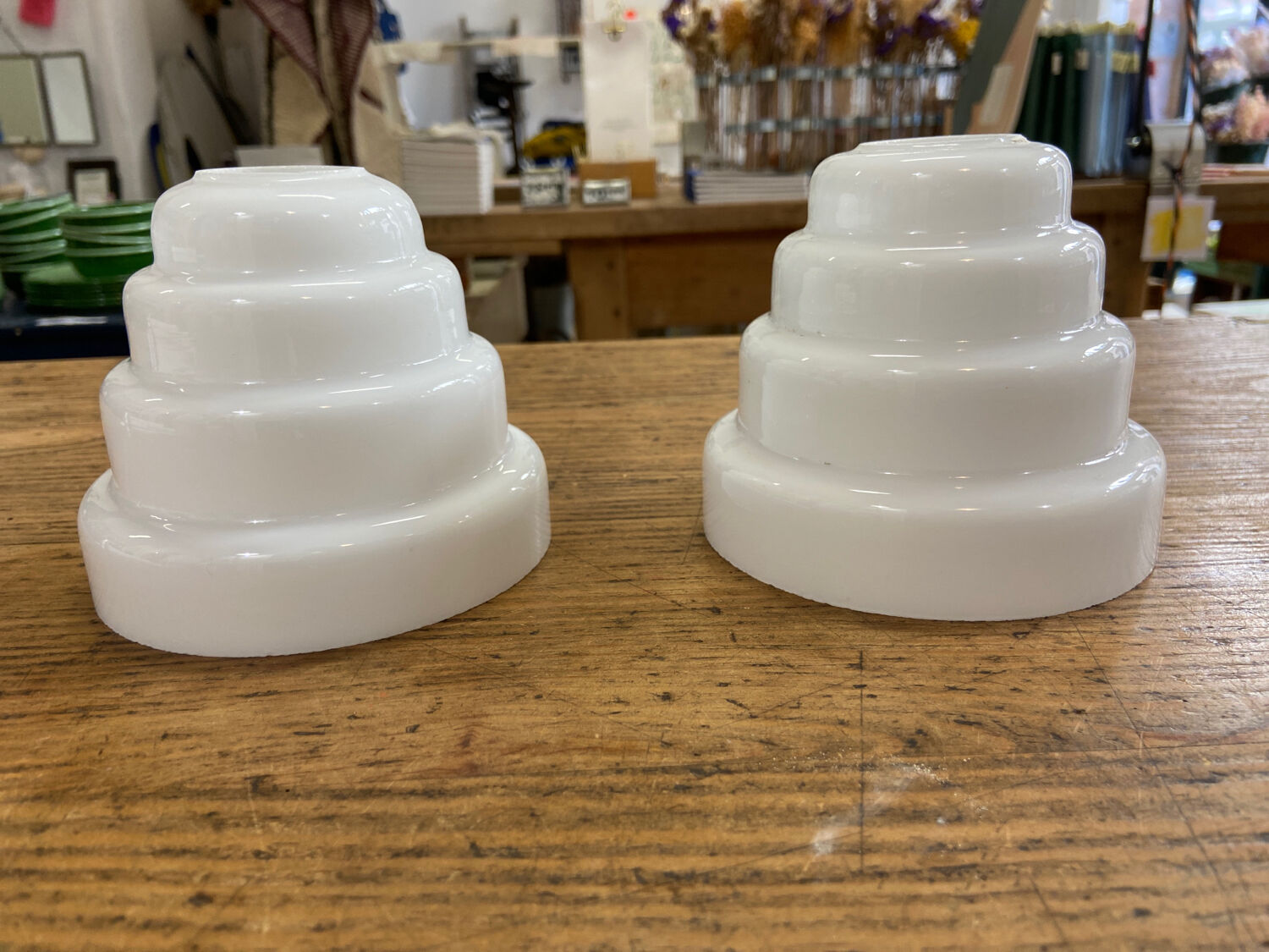 Pair of white glass pendant lights