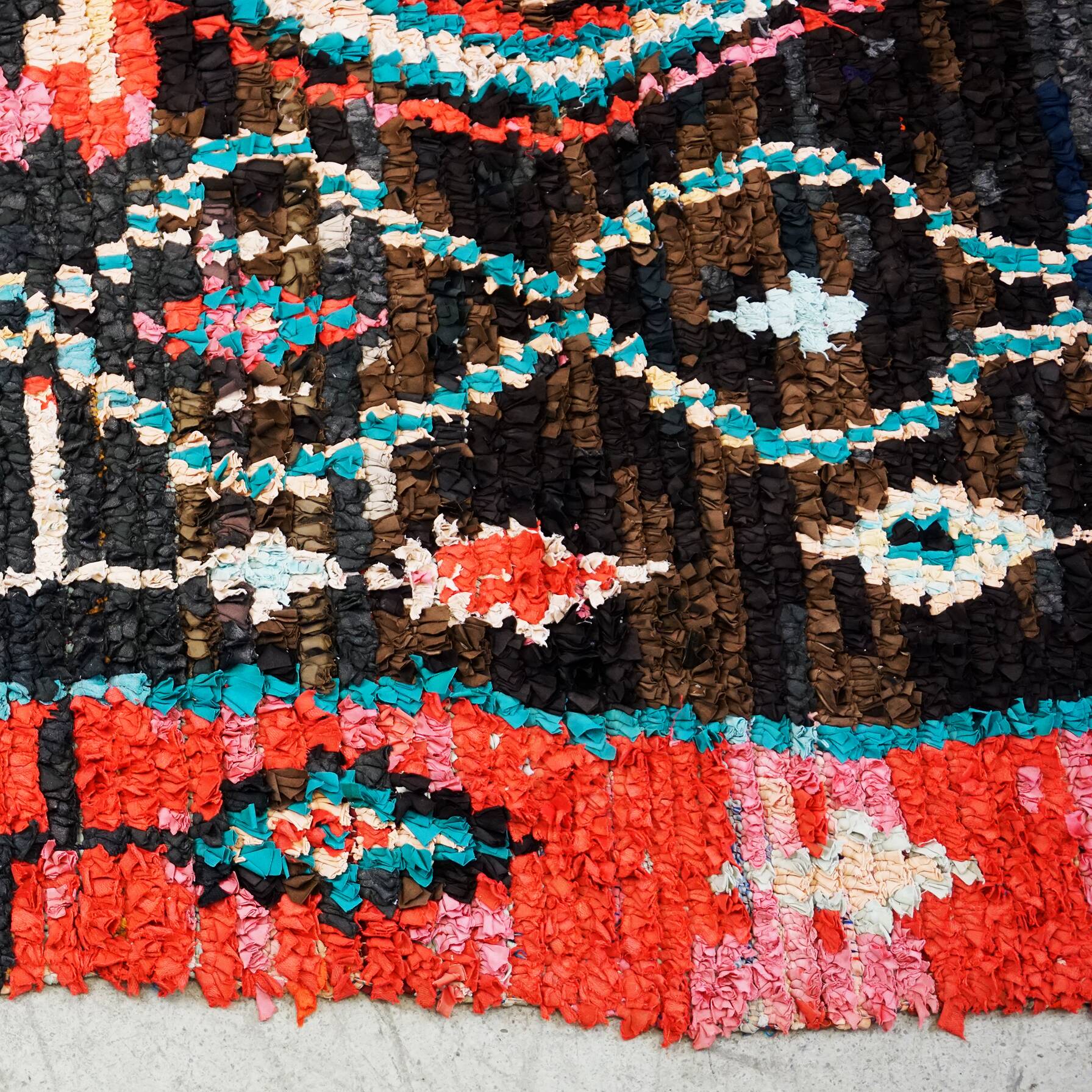 Multicoloured hand-knotted Moroccan Berber Boucherouit rug, vintage.