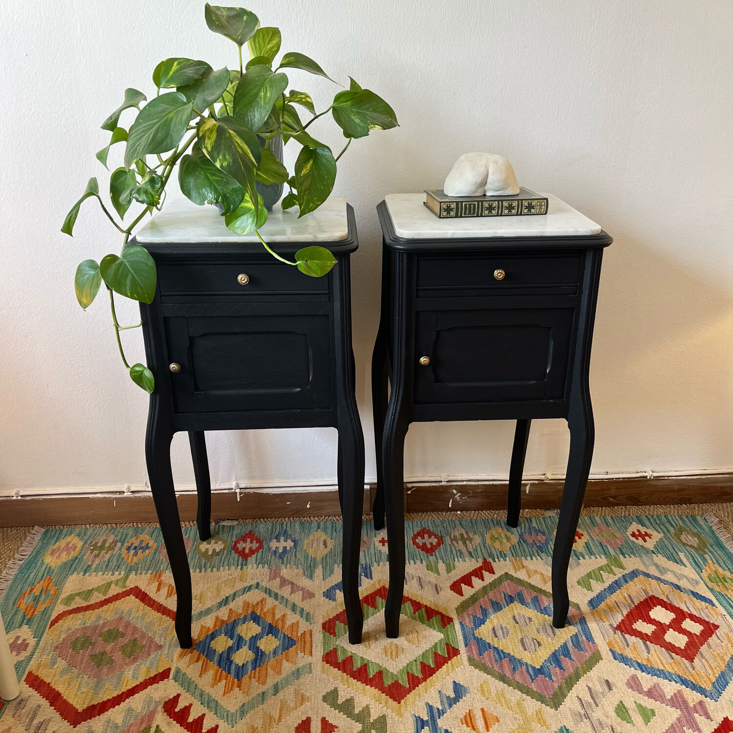 Pair of marble and wood bedside curved feet