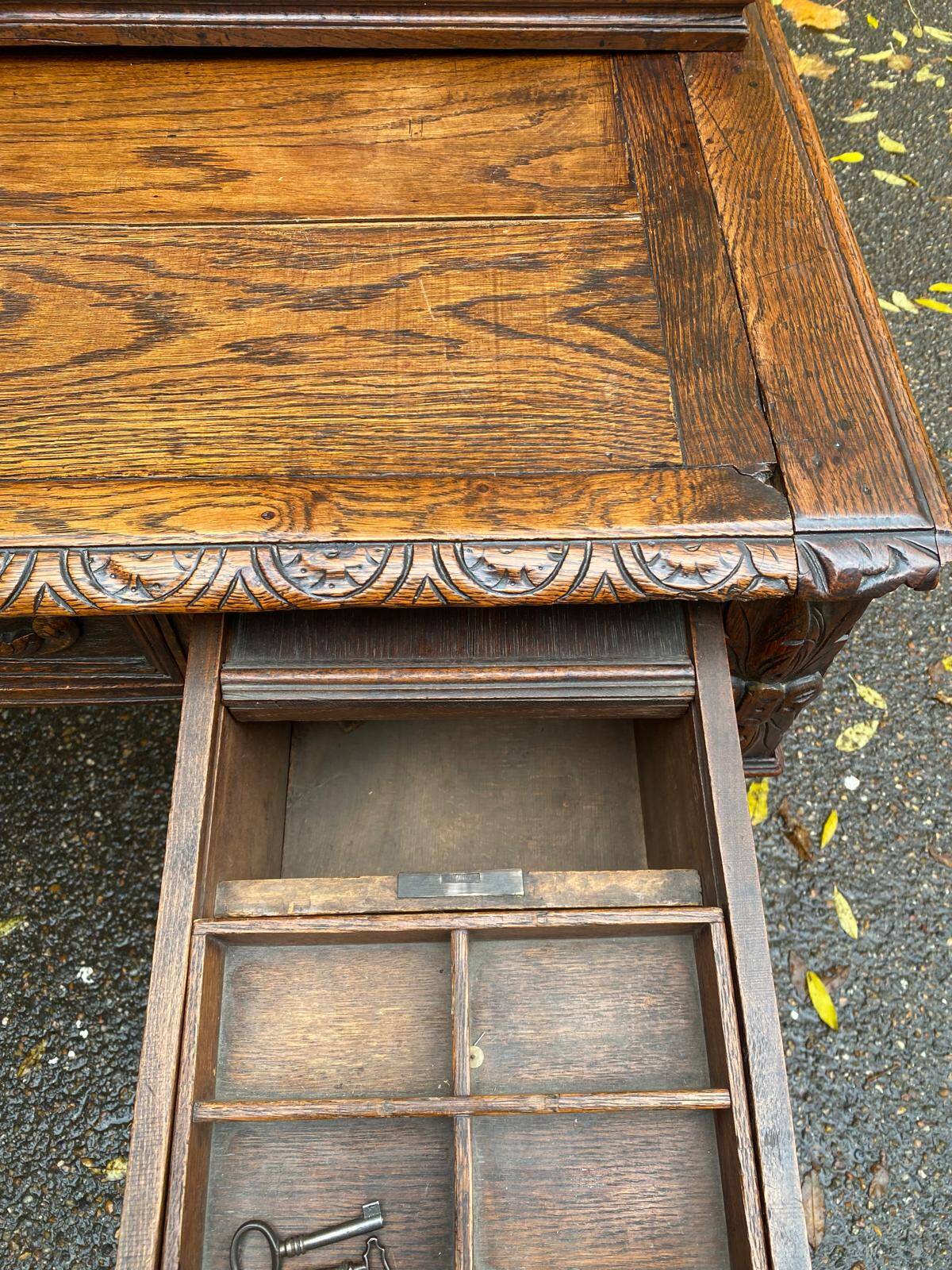 19th-century Renaissance carved oak desk with chair