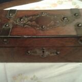 Old studded wooden box adorned with flat iron