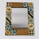 Miroir stylisé en bois et email 1960