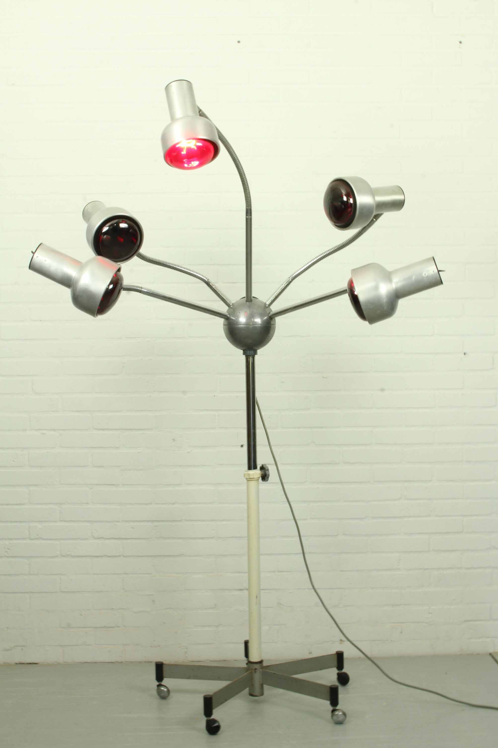Chrome mid century modern adjustable five-arm lamp on wheel base