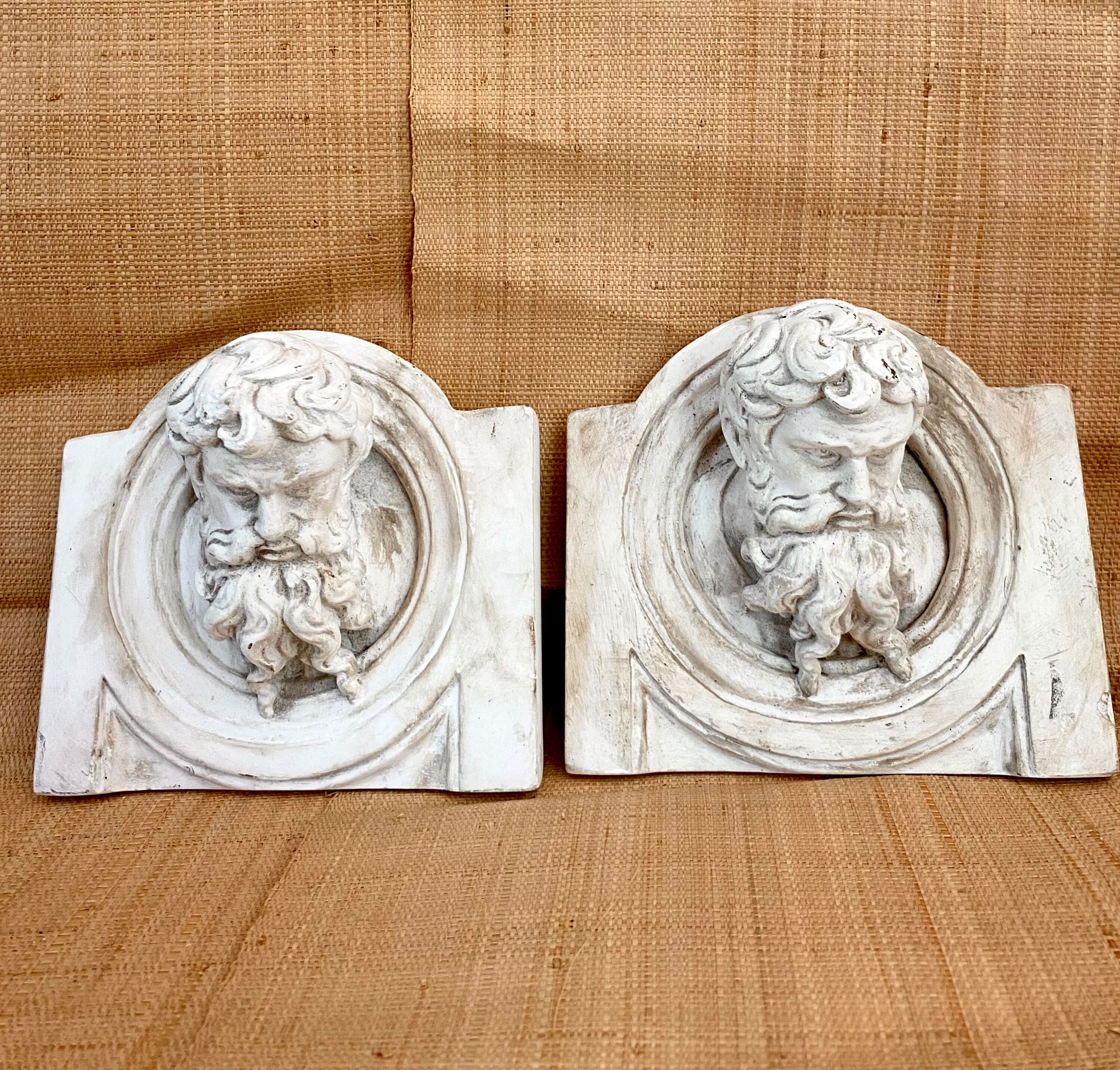 Two moulds; plaster heads