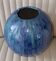 Boiled cardboard ball vase