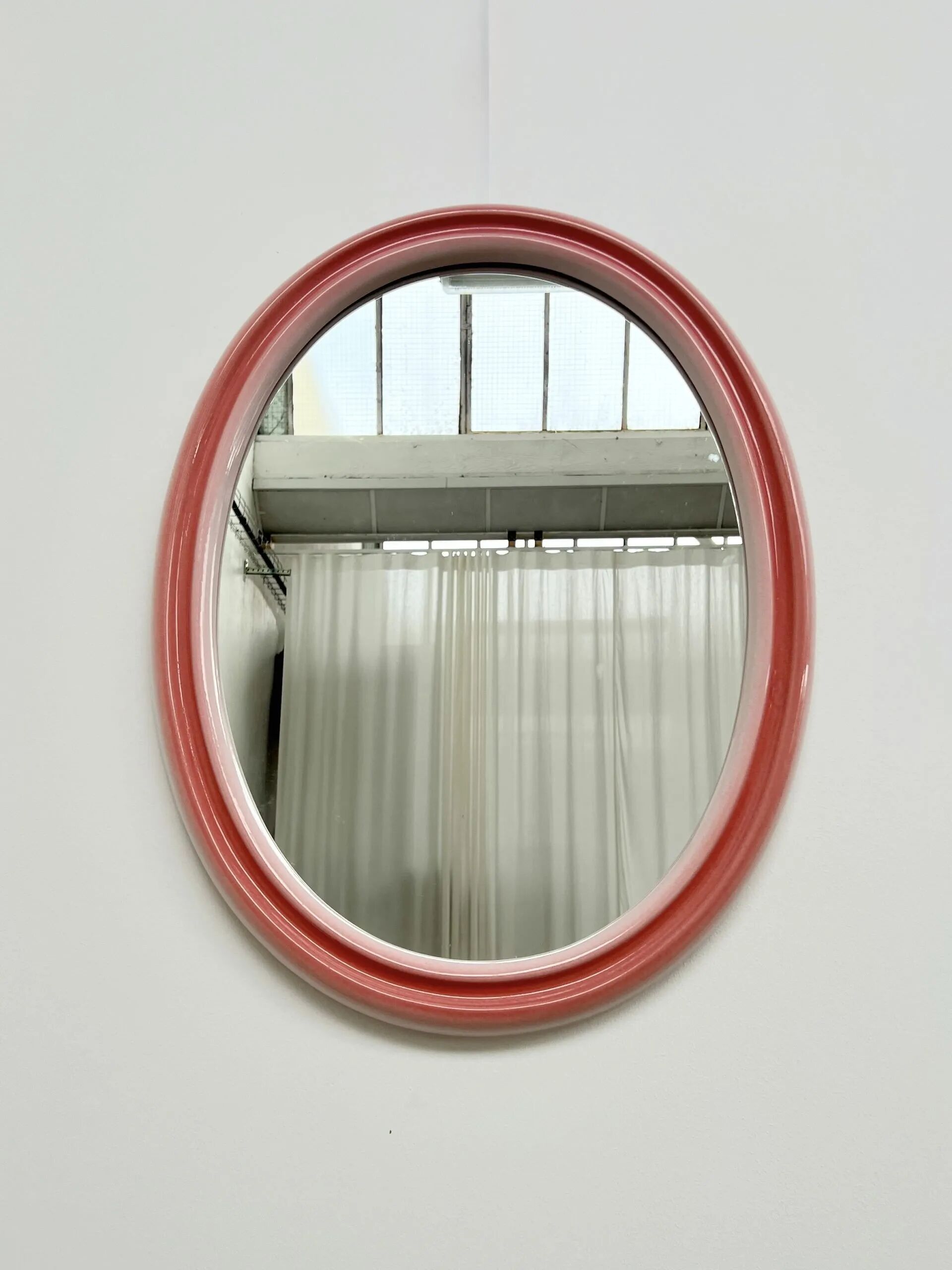 Large oval pink ceramic mirror (76cm) – vintage Italian design