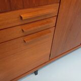 High Scandinavian modernist vintage sideboard in teak and black metal.