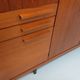 High Scandinavian modernist vintage sideboard in teak and black metal.