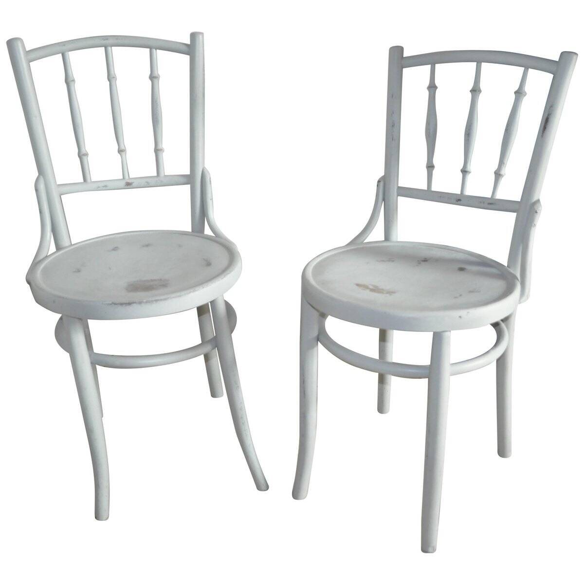 Pair of Lichtig bistro chairs in painted grey beech, pressed seat, circa 1900.