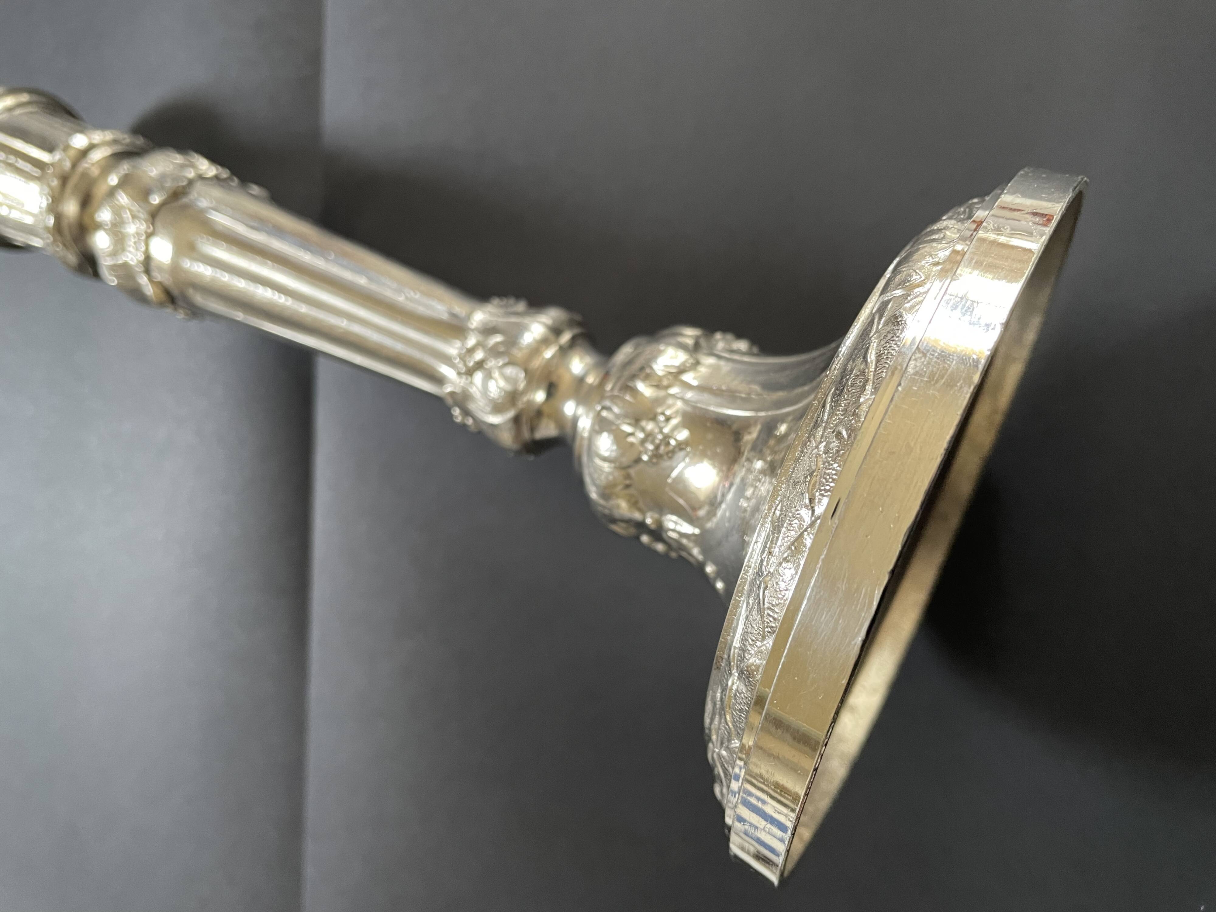 Antique silver-plated candlesticks in classic style