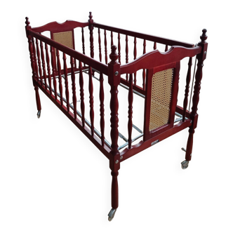 Vintage wood and cane child's bed