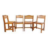 Set of 4 vintage pine chairs from the 70s