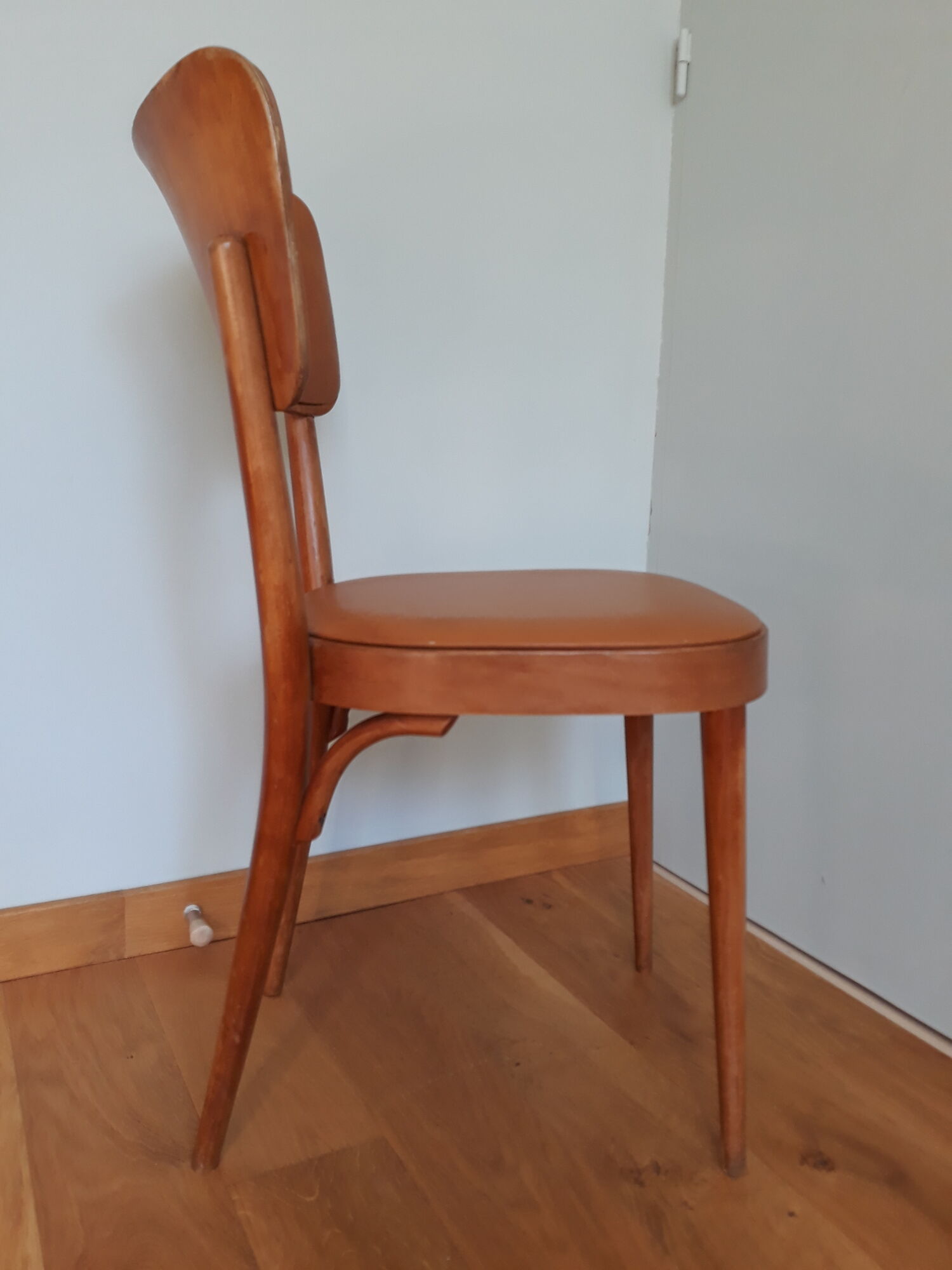 Bistro chair Baumann 1963 curved wood and skaï imitation leather caramel