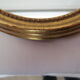 Oval wooden mirror gilded tower, medallion type