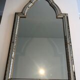 Mirror consisting of multi-faceted mirrors and brass garlands, French work, around 1970
