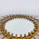 Vintage rattan sunburst mirror from the 1960s