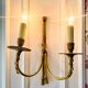 Wall light in solid brass in Empire / Neoclassical style.