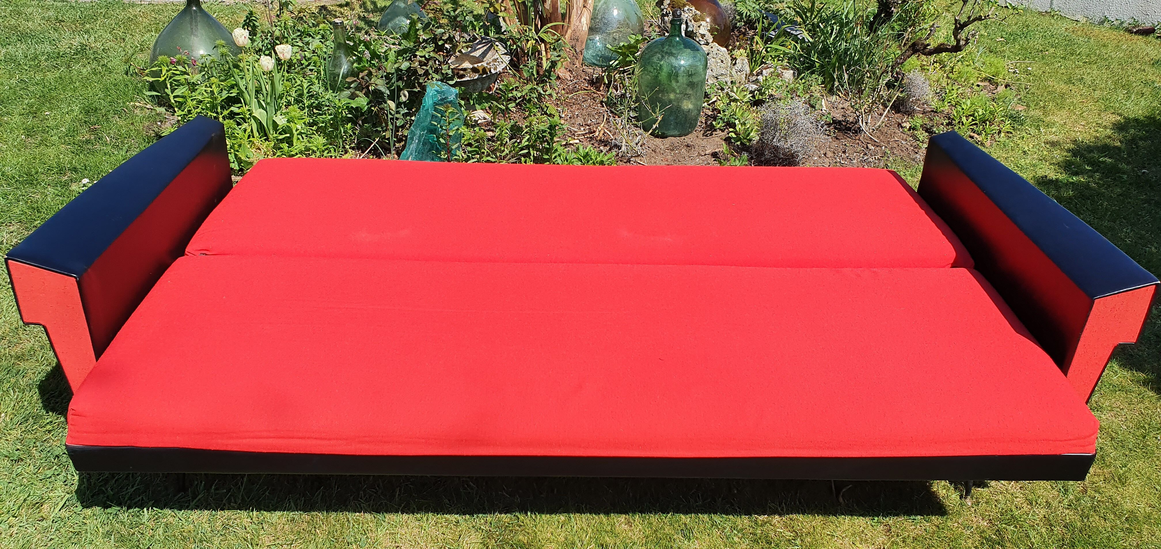 Vintage sofa 3 places convertible, red fabric and black skaï.1960s.